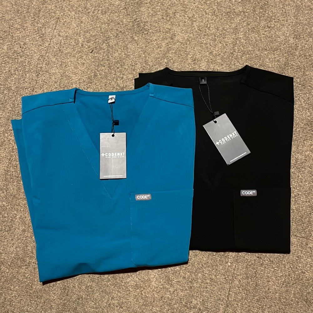 Set of two Code NXT scrub tops